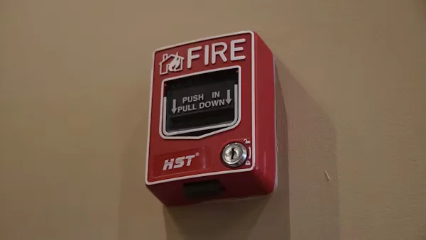 fire alarm mounted to a wall.